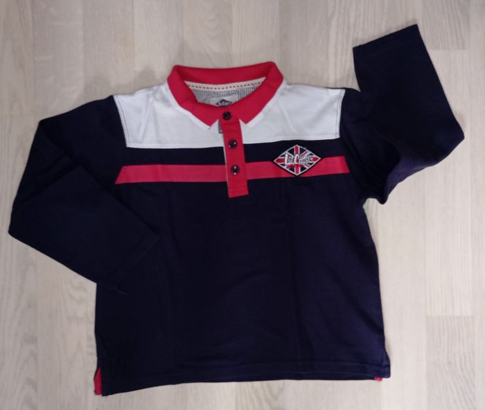 Polo bleu marine
Lee Cooper 
T. 10 ans