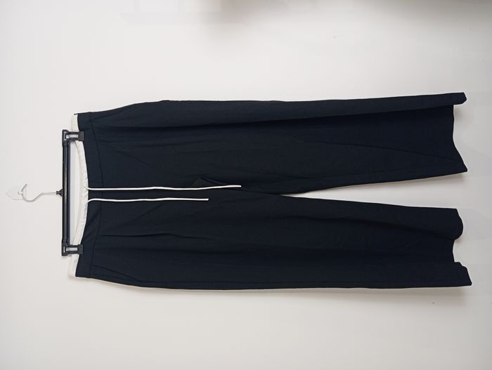 Pantalon noir fluide à cordes Zara Taille 44