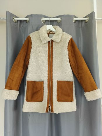 Veste fausse fourrure