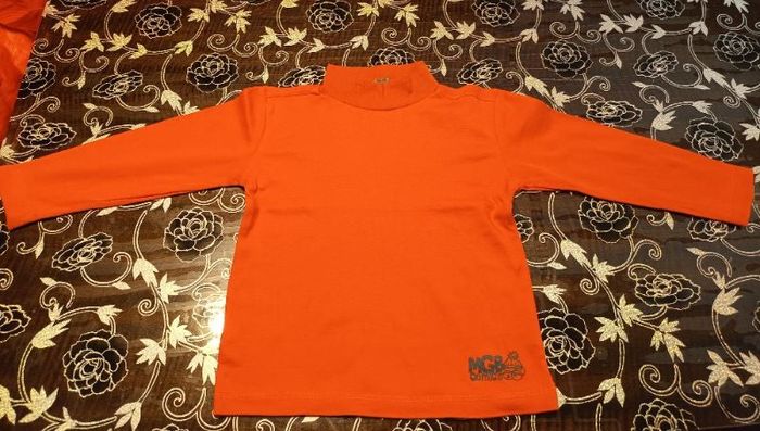 Pull col rond orange imprimé MGB Comics