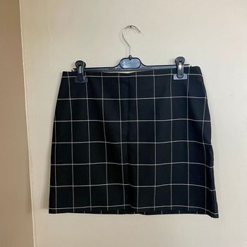 Jupe courte noire à carreaux blancs H&M taille 42 zip doré devant style graphique V062