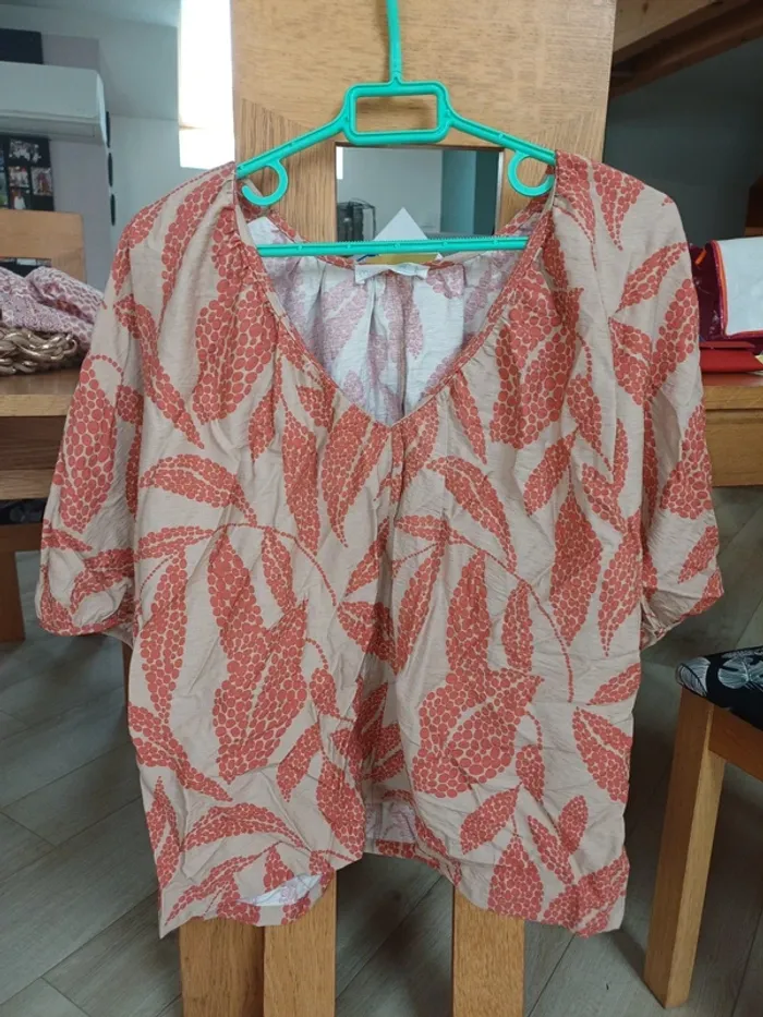 Chemise manches courtes.