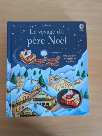 Livre Le Voyage du Père Noël neuf