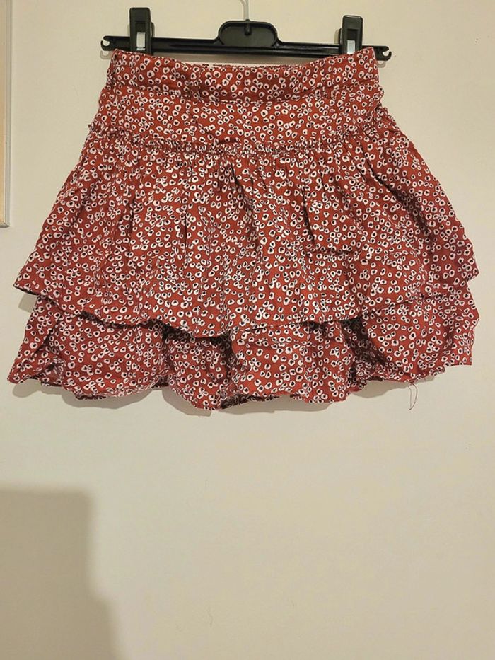 Jupe rouge- bordeaux à fleurs blanches "okaidi" taille 8 ans - photo numéro 2