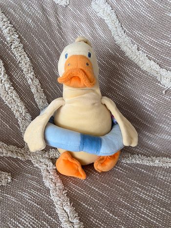 Peluche doudou musical 33cm Sucre d'Orge canard jaune orange et bleu très bon état
