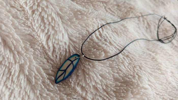 Collier plume 🔄 - photo numéro 3