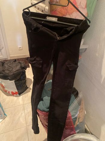 Jean noir avec poche sur les côtés