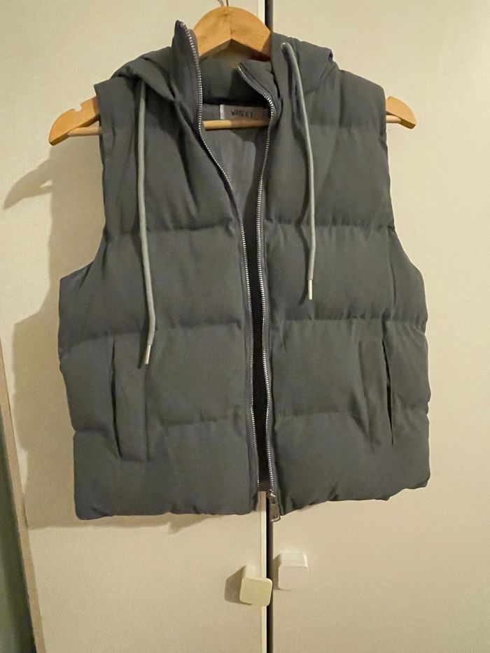 Doudoune. Sans manche