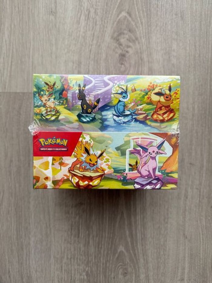 Display Pokémon Mini tins Évolutions Prismatiques EV8.5 Scellée - photo numéro 2