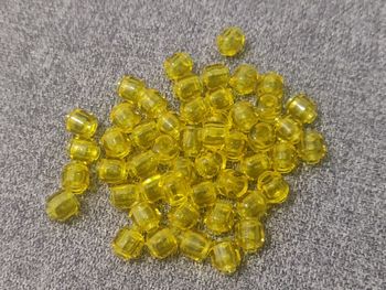 50 pièces têtes jaunes transparentes Lego - jamais utilisées parfait état - vrai Lego