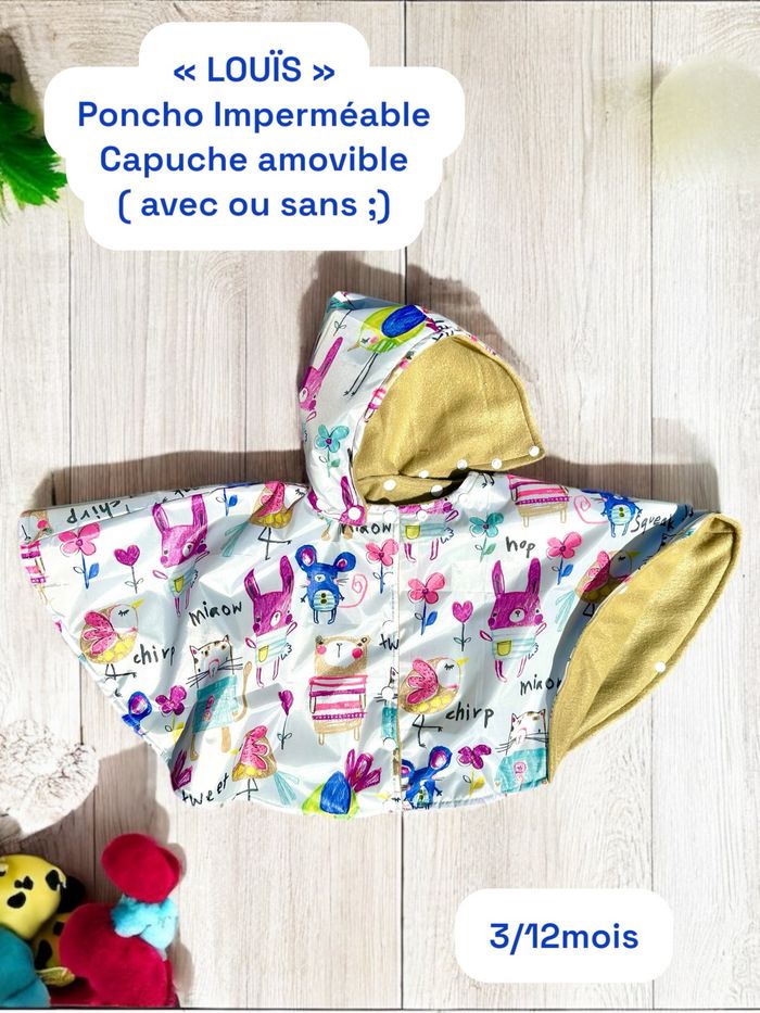 Poncho imperméable 3/12mois capuche amovible