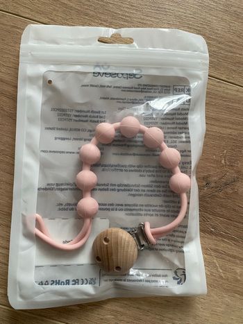 Attache tétine 