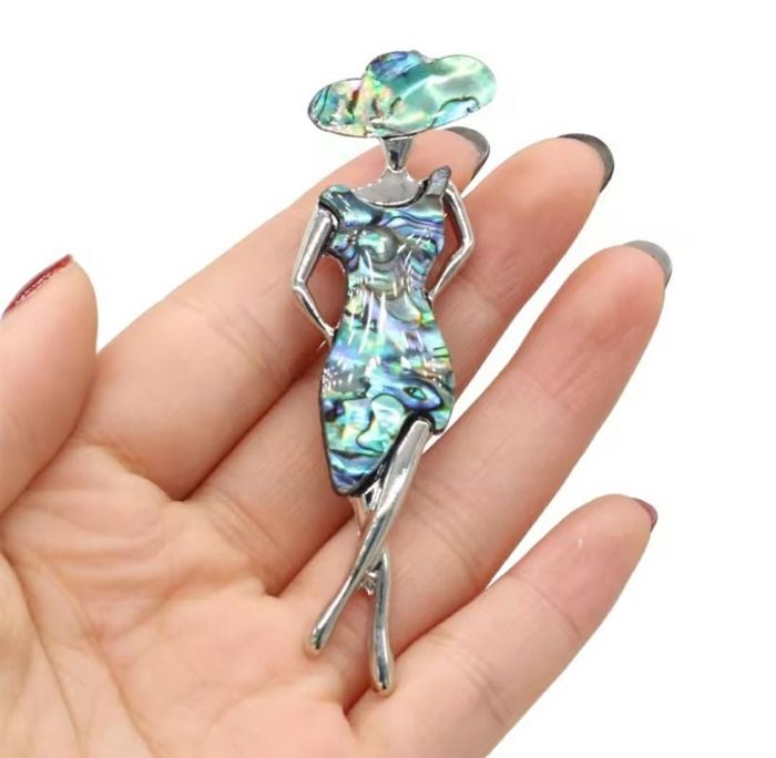 Broche "Femme" métallique