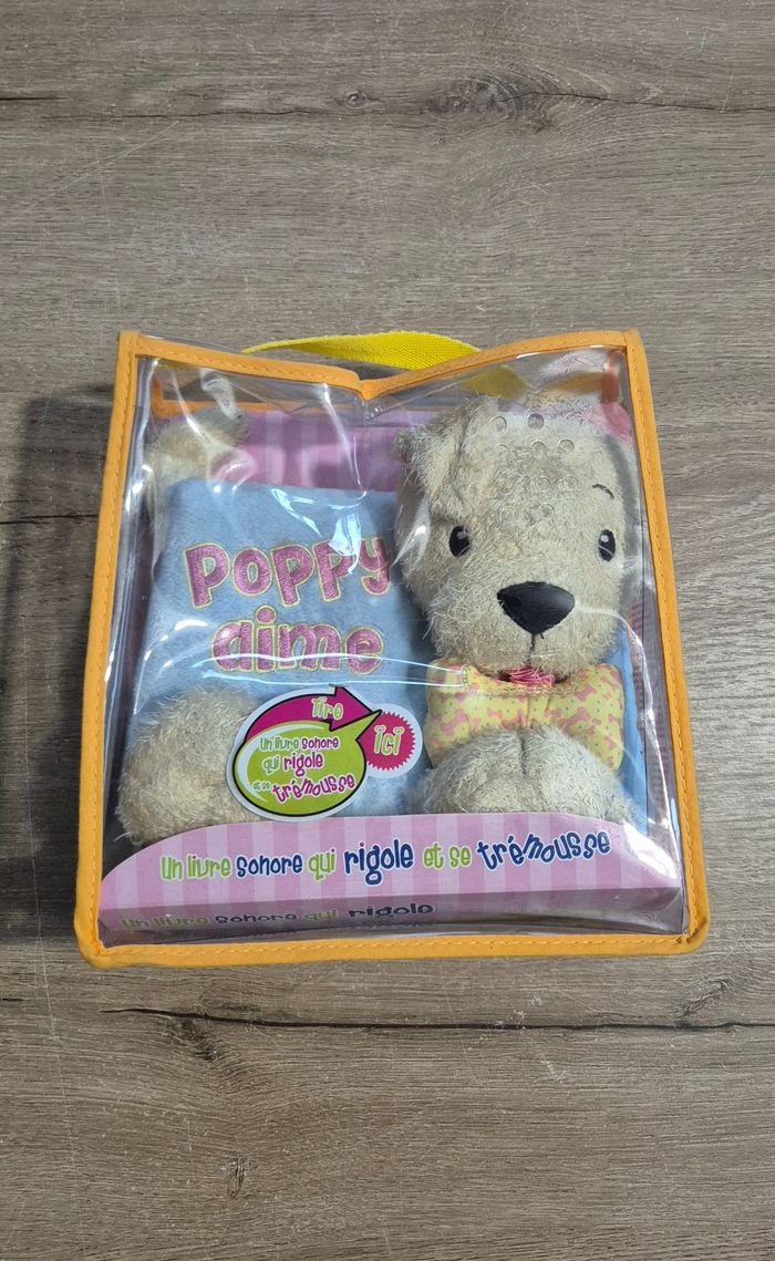 Livre en tissus vibrant Poppy aime