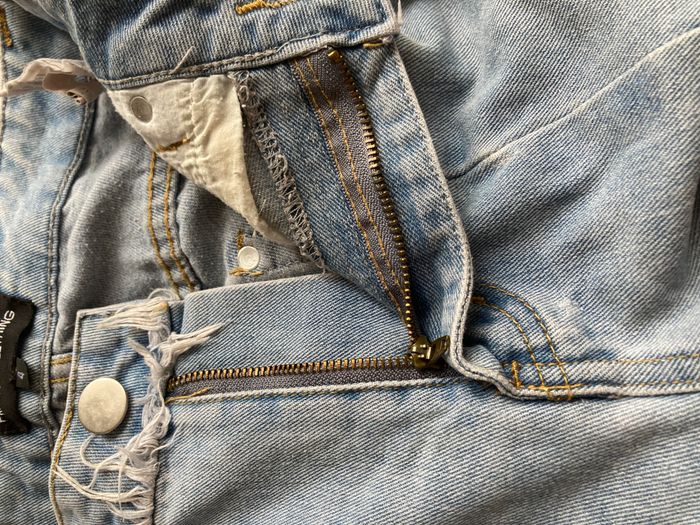 jeans droit effiloché à la taille - photo numéro 5