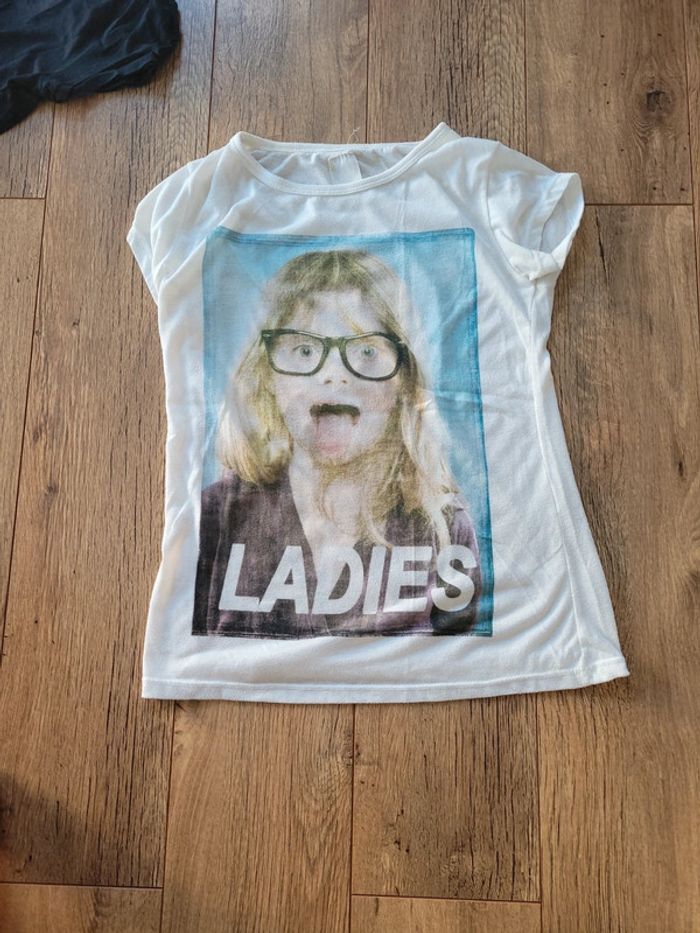 Tee shirt blanc 14 ans bon etat