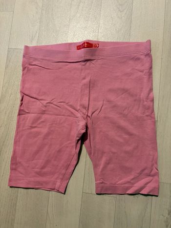 Short rose tissaia 10 ans très bon état