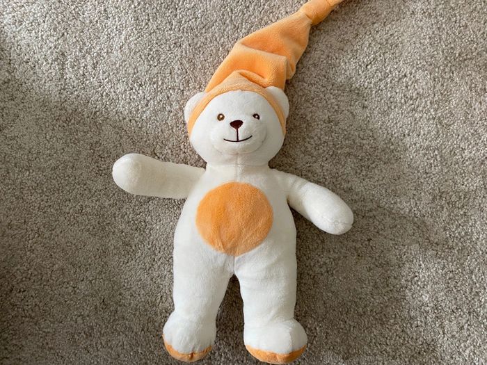 Peluche doudou ours blanc et orange Gipsy 🌻