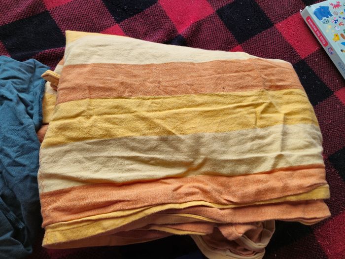Echarpe de portage non tissée