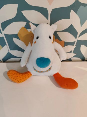 Doudou peluche chien musical orchestra