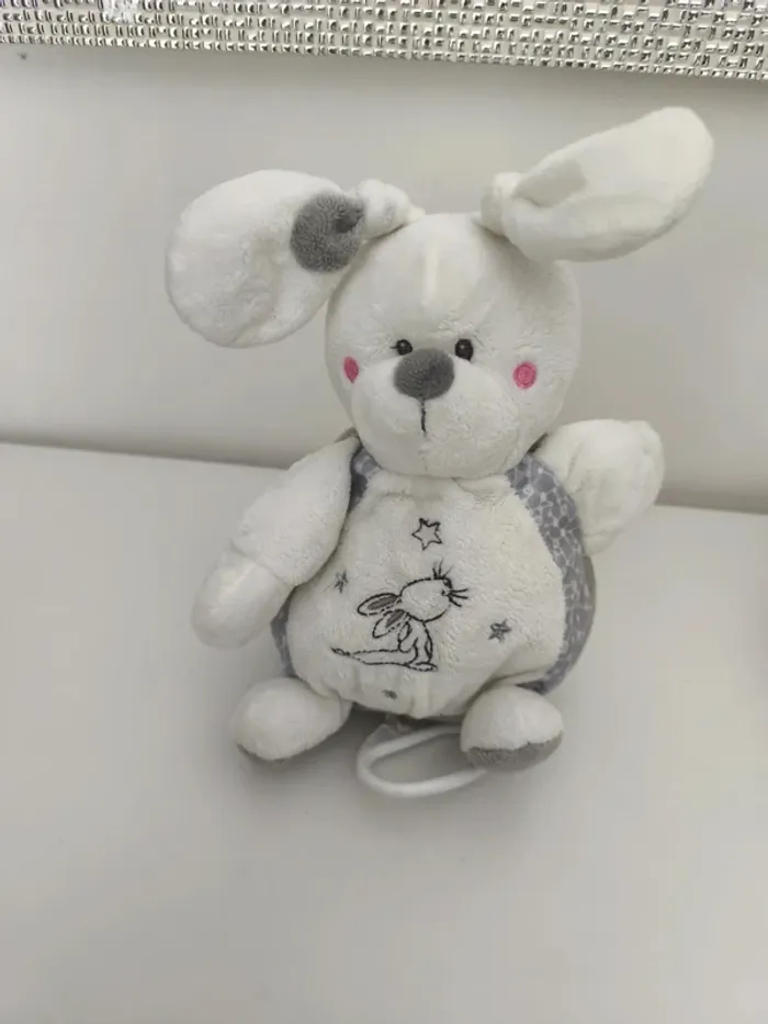 Peluche boîte musical