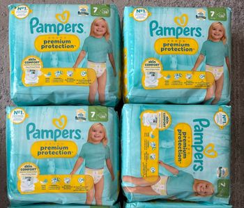 4 paquets de couches Pampers taille 7