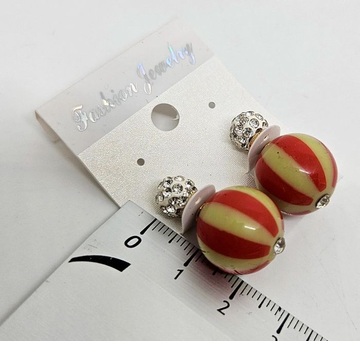 Paire de boucles d'oreilles.
Neuve. - photo numéro 5