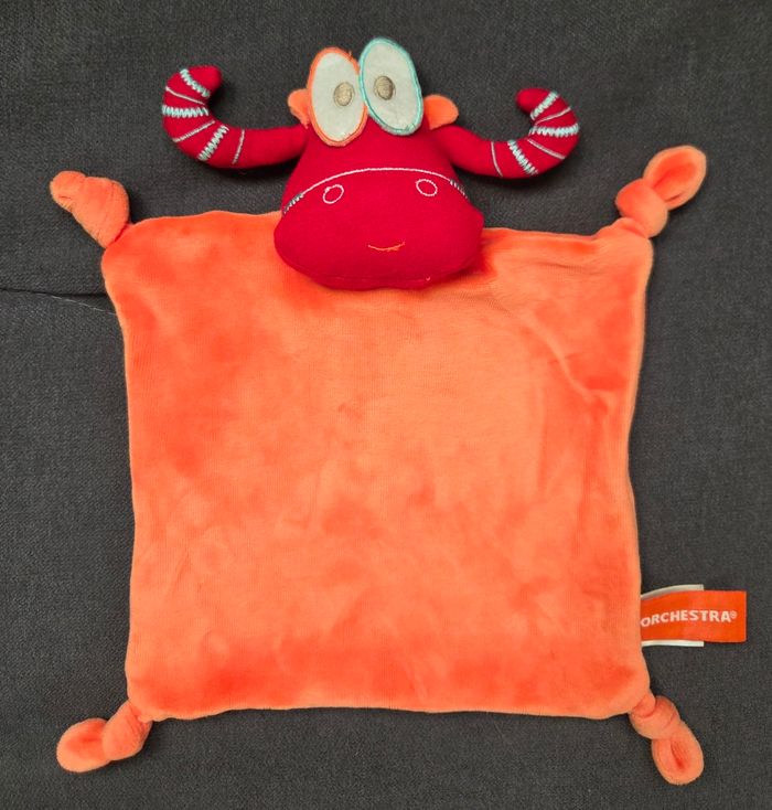 Doudou plat taureau orange et rouge- Orchestra