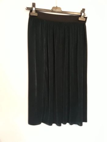 Jupe midi plissėe  taille haute.