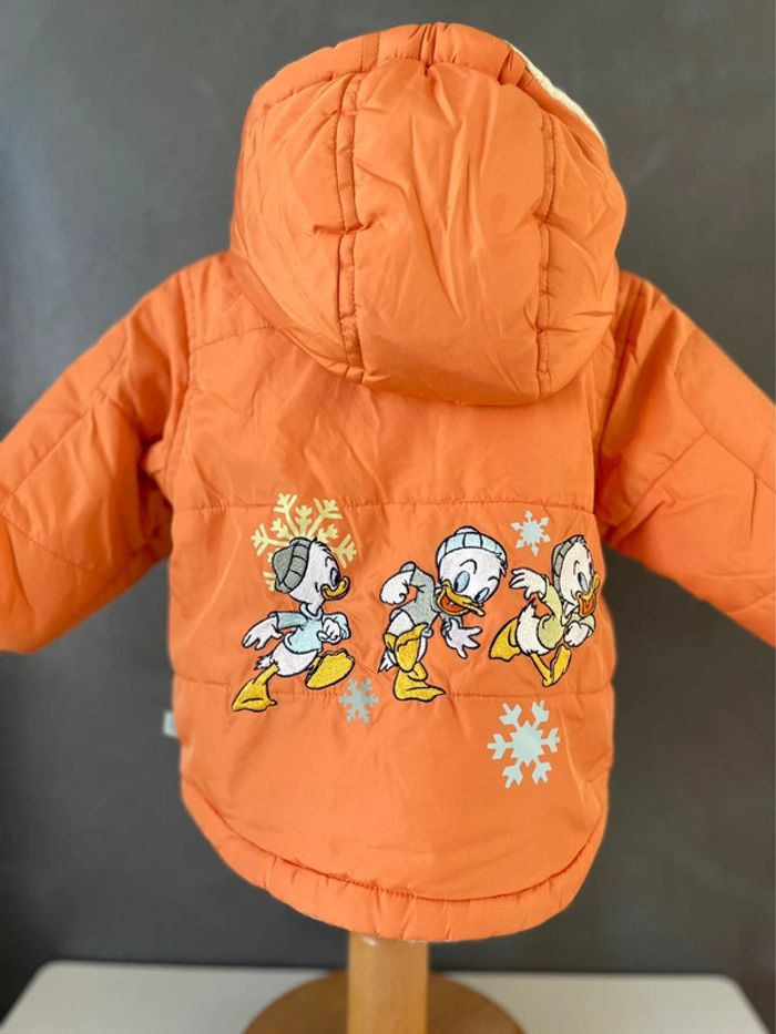 Manteau orange Disney bébé - photo numéro 3