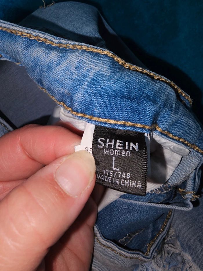 Jeans à trou - photo numéro 2