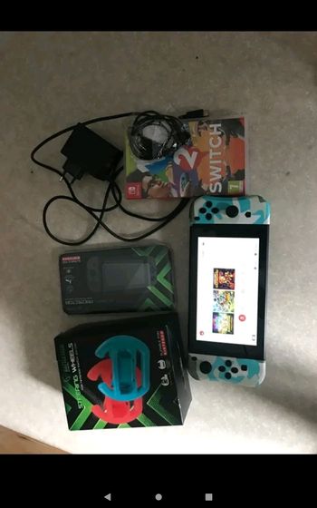 Switch avec accessoires et jeu