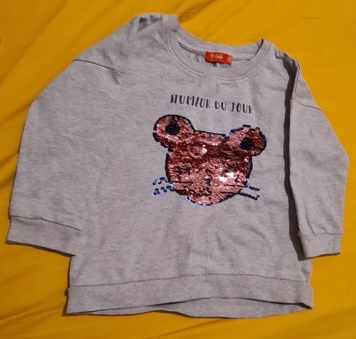 Pull avec sequin réversible