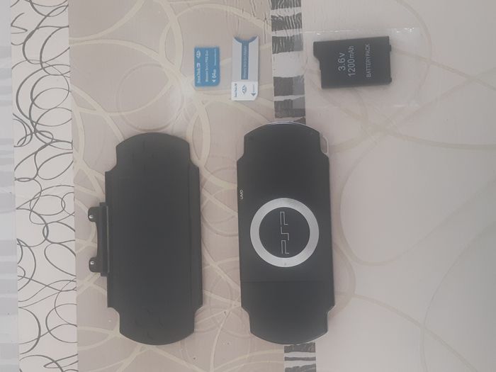 PSP Slim & Lite + Jeux + Films - photo numéro 6