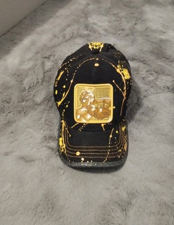 Casque noir jaune doré freezer gold - dragon ball neuve
Réglable a l'arrière