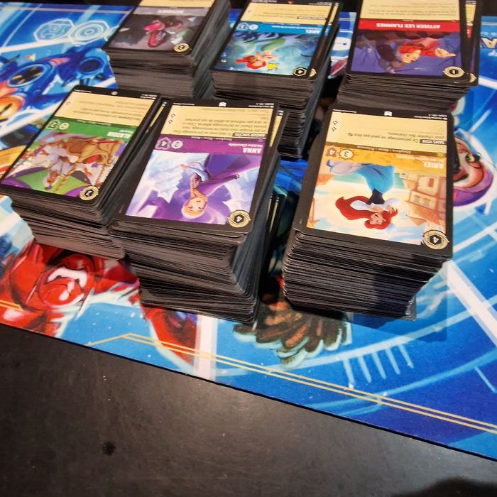 Lot lorcana plus de 900 cartes sans doubles de la commune a la super rare chap 1 a 8 - photo numéro 3