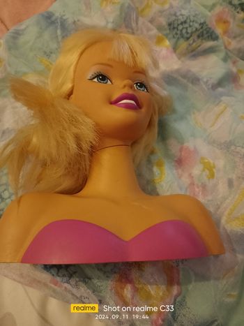 Tête a coiffer très bonne état