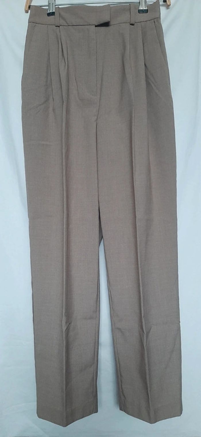 Pantalon femme avec des plis
