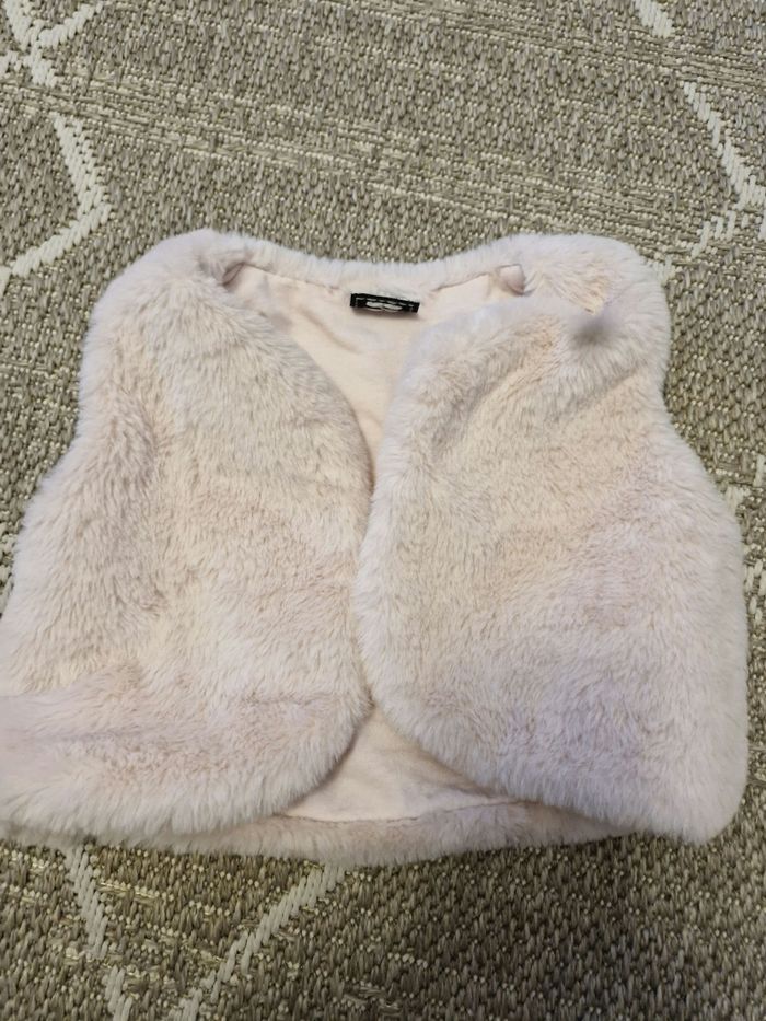 Veste fausse fourrure