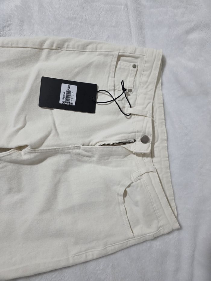 Jean patte d’éléphant blanc - photo numéro 6