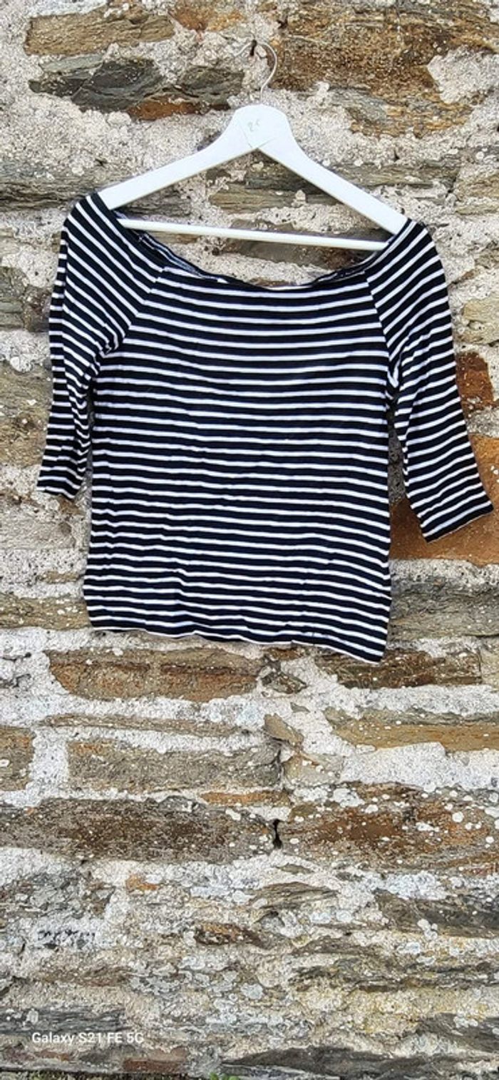 Pull épaules dénudé