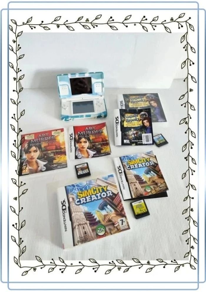 Lot nintendo ds avec une nintendo blanche en bon état mais il y'a des traces + 3 jeux
