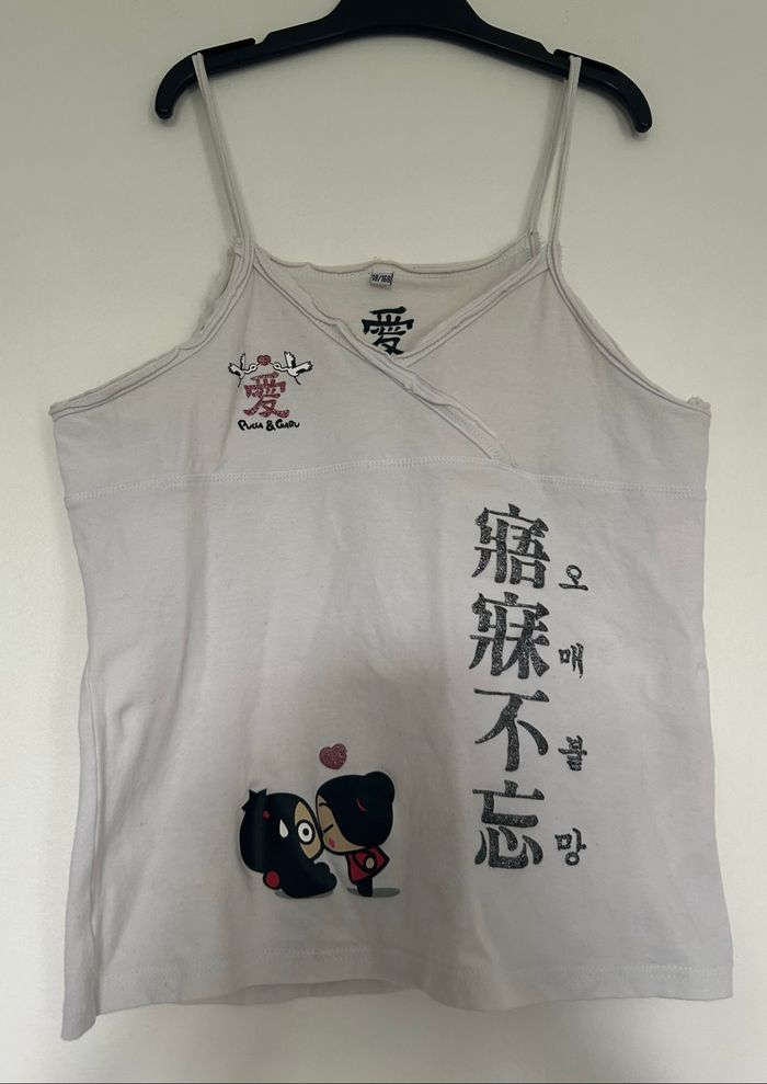 Tee shirt à bretelles Pucca taille 18 ans (168 cm)