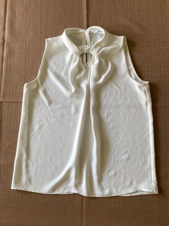 Haut blanc sans manche élégant M