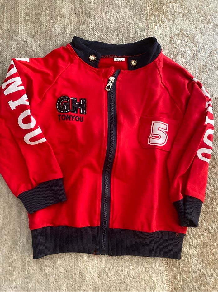 Gilet neuf 3/4 ans