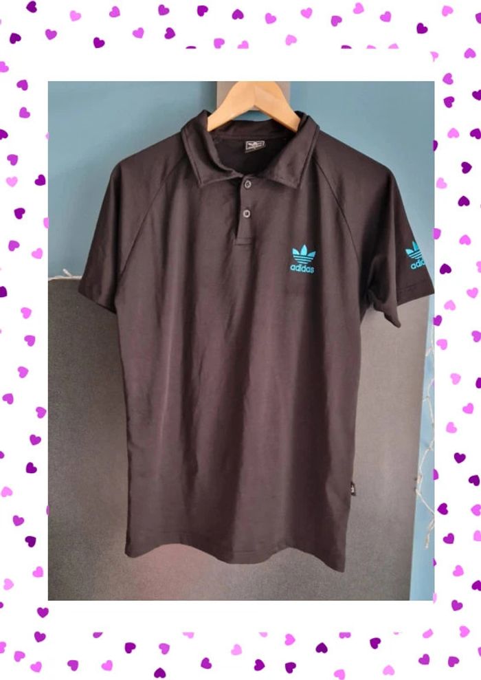 Polo noir logo bleu