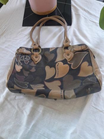 Très beau sac en cuir a motifs vintage Lancaster