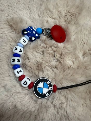 Attache tétine  bmw