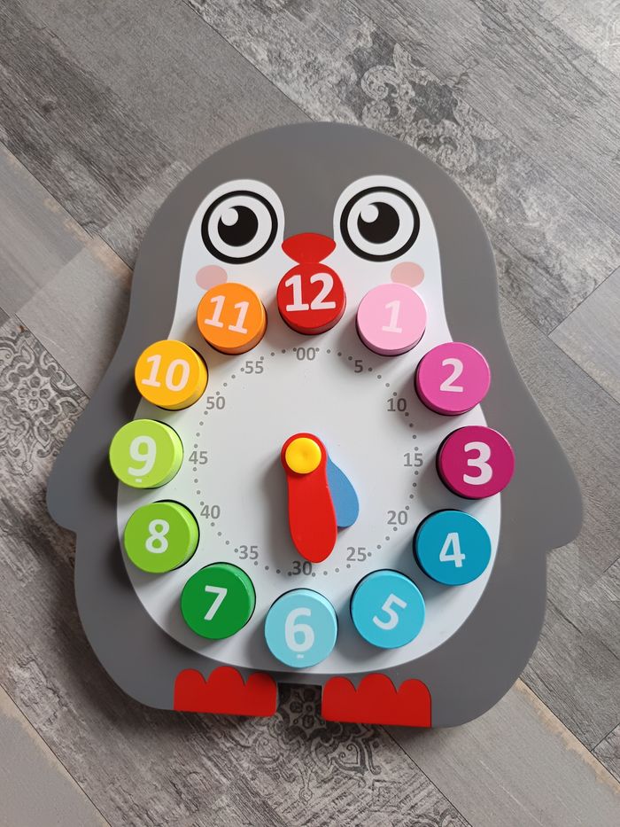 Horloge apprentissage pingouin