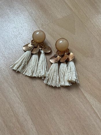 Boucles d’oreilles pompons